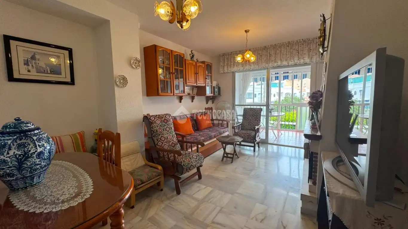 Sala de estar de Dúplex en venta en Motril con Terraza, Piscina y Piscina comunitaria