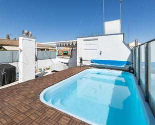 Swimming pool of Attic for sale in  Granada Capital  with Heating, Terrace and Swimming Pool