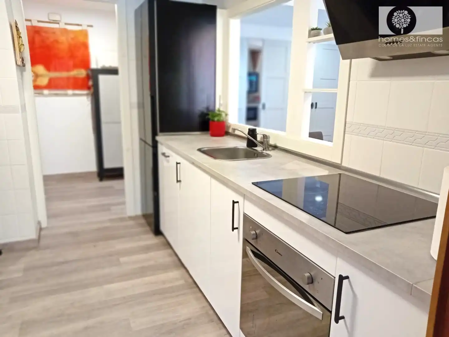 Küche von Wohnung zum Verkauf in Ayamonte mit Klimaanlage, Privatgarten und Möbliert