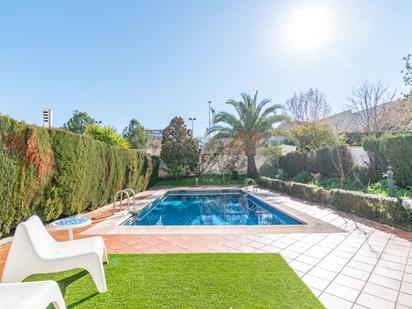 Swimming pool of House or chalet for sale in  Granada Capital  with Air Conditioner, Heating and Private garden