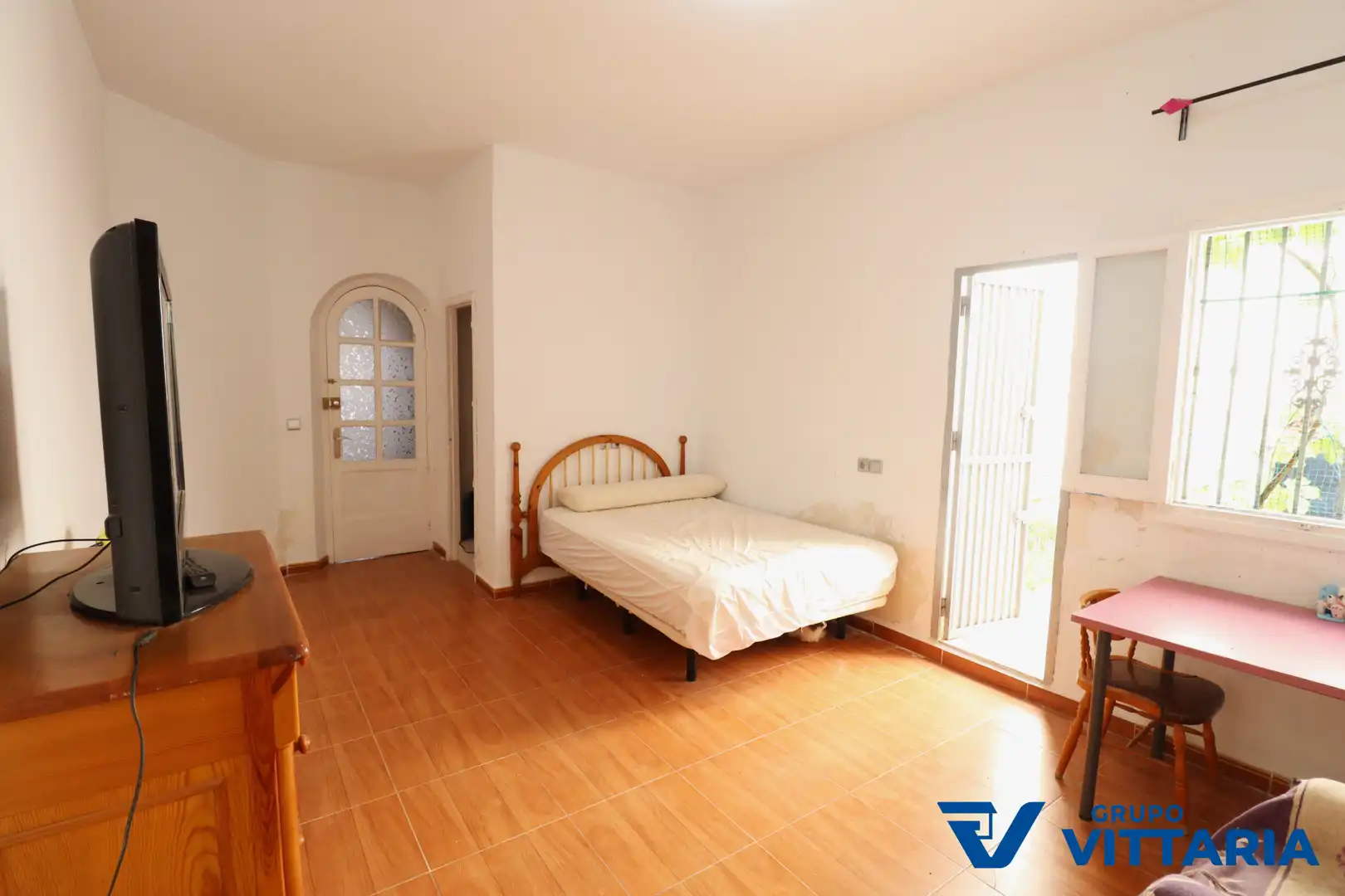 Habitación de Casa adosada en venta en Almería con Aire acondicionado, Terraza y Trastero