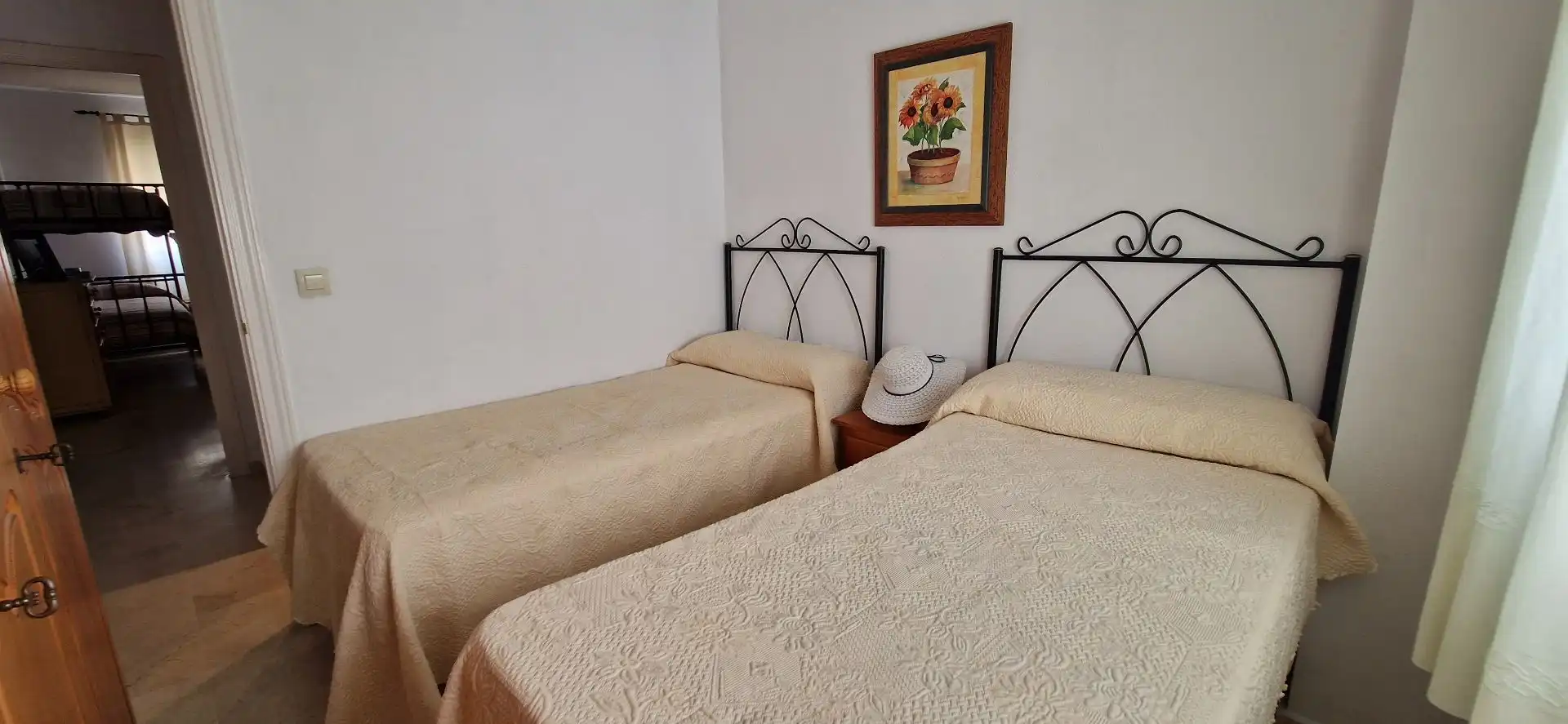 Dormitori de Apartament de lloguer en El Portil amb Moblat i Piscina comunitària