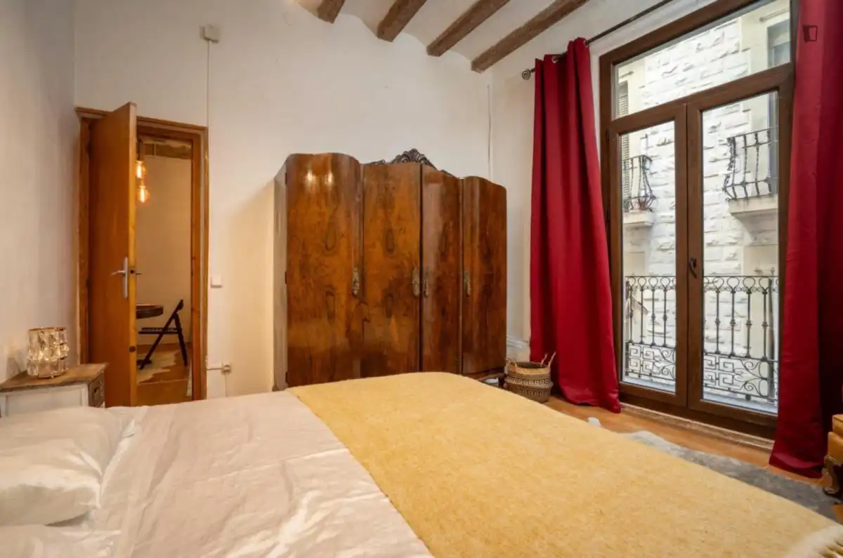 Dormitori de Apartament de lloguer en Barcelona amb Aire condicionat, Moblat i Rentadora