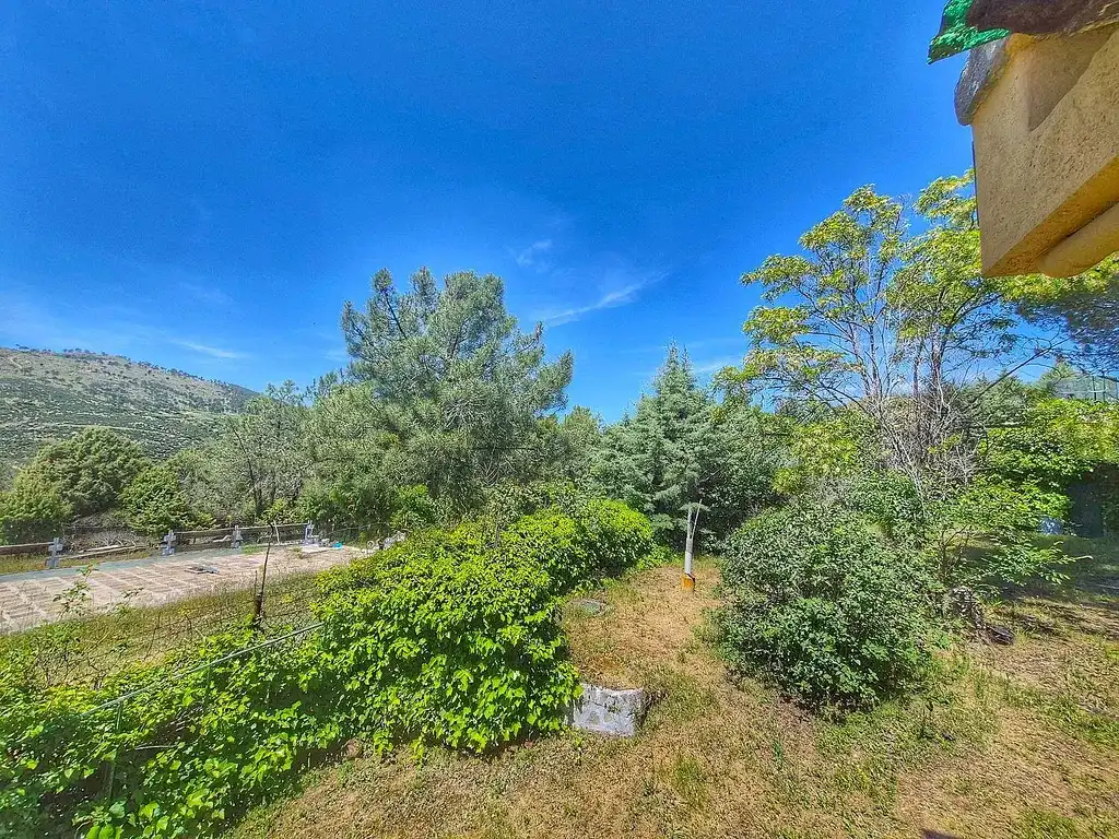 Einfamilien-Reihenhaus zum Verkauf in Santa María de la Alameda mit Privatgarten und Terrasse