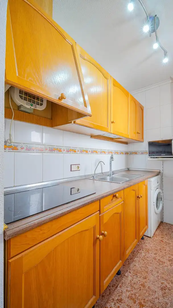 Cuina de Àtic en venda en Torrevieja amb Terrassa i Piscina comunitària