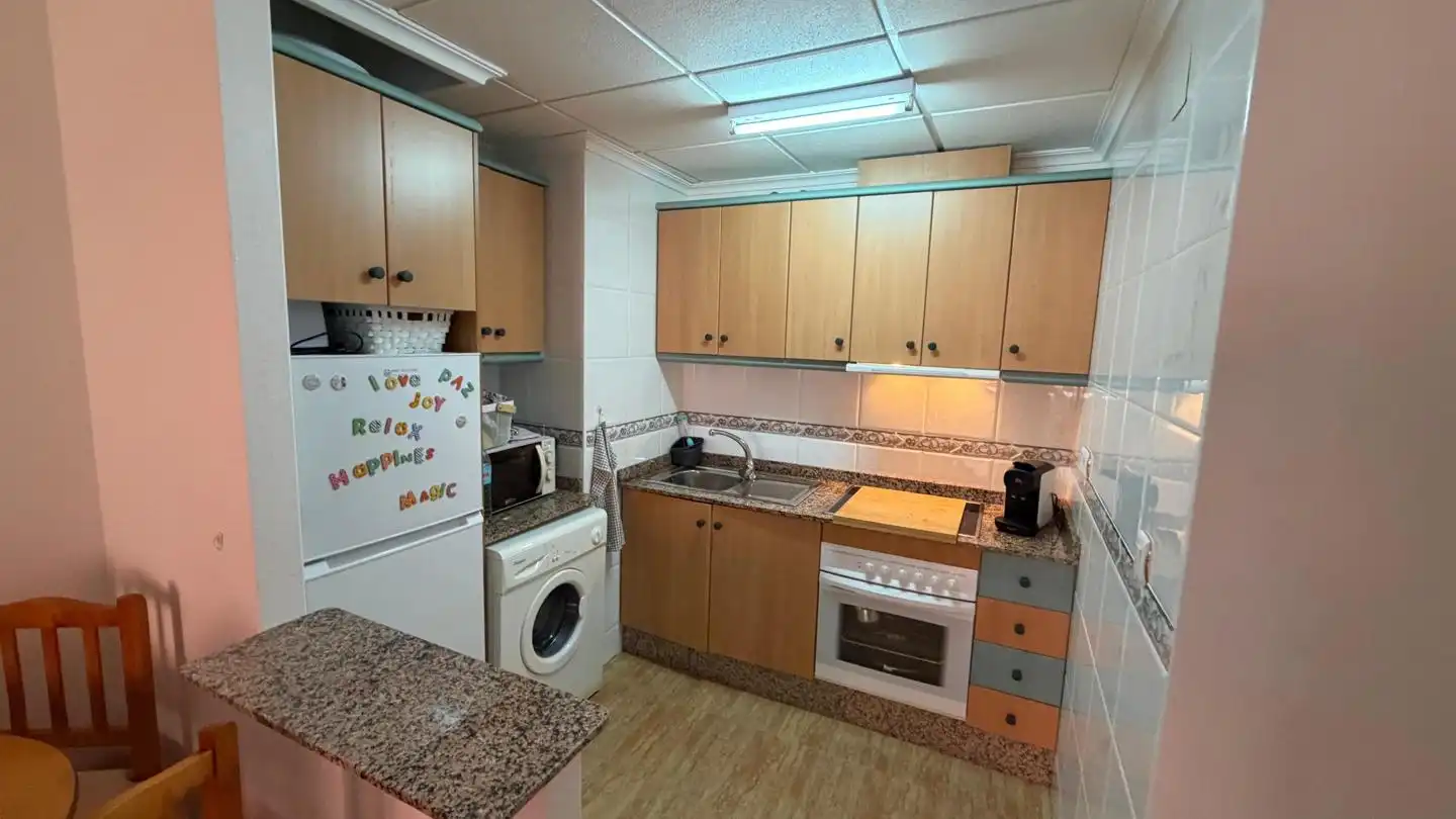 Cocina de Apartamento en venta en La Manga del Mar Menor con Aire acondicionado, Terraza y Piscina