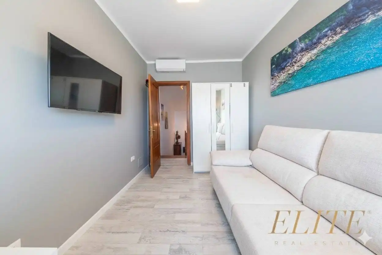 Wohnzimmer von Einfamilien-Reihenhaus zum Verkauf in Mogán mit Klimaanlage, Heizung und Terrasse