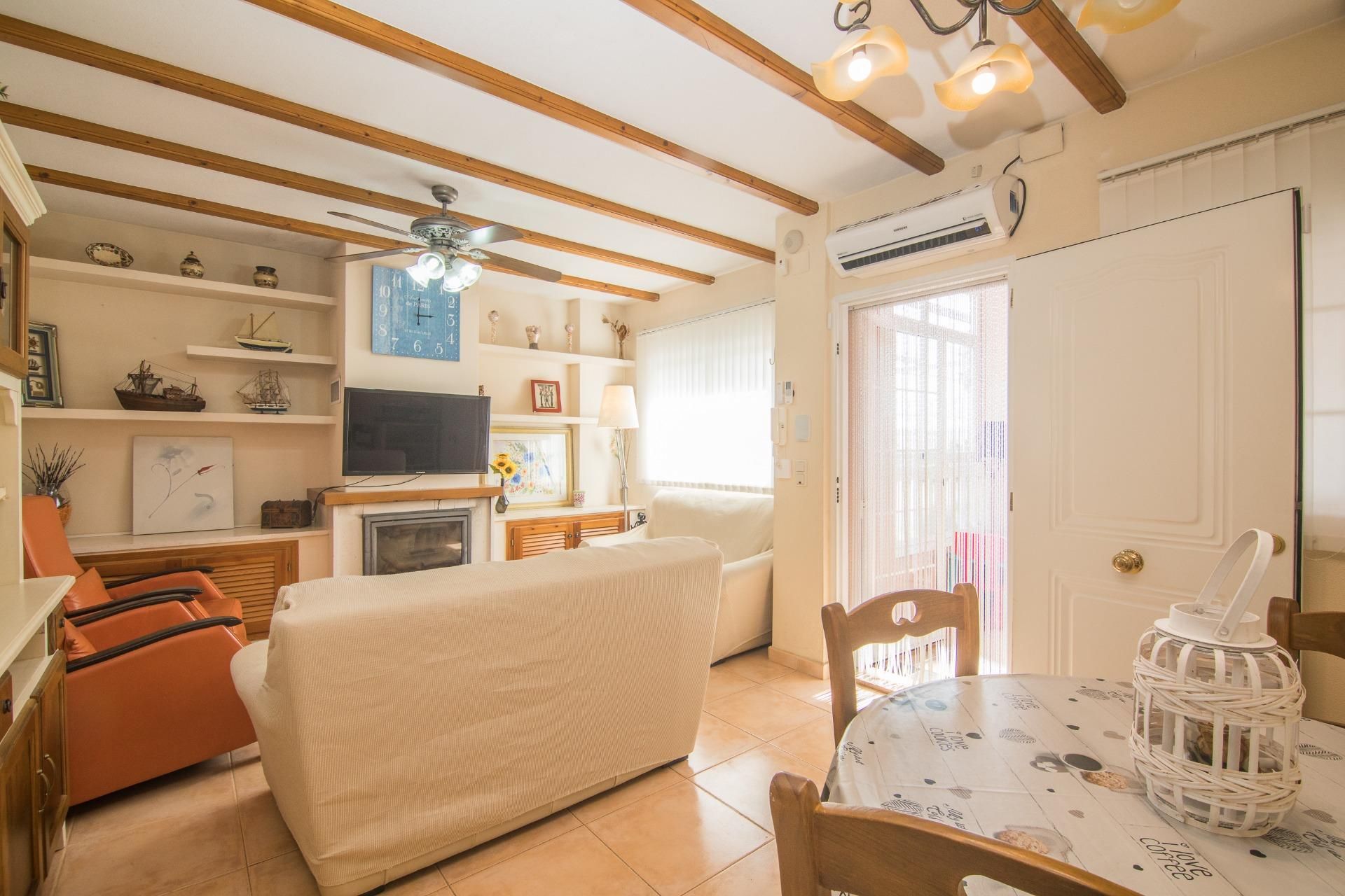 Sala d'estar de Casa o xalet en venda en Santa Pola amb Calefacció, Jardí privat i Terrassa