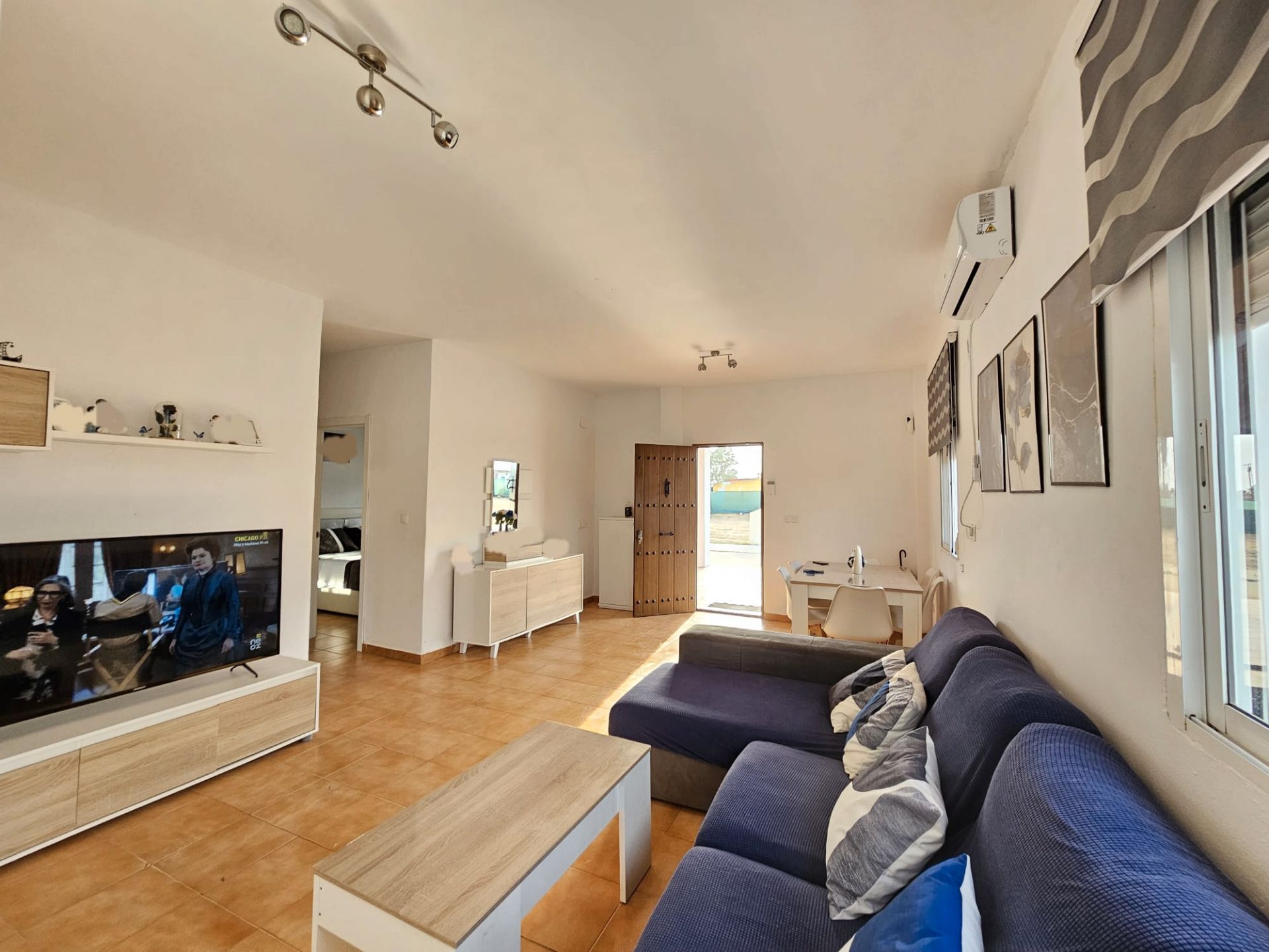 Living room of House or chalet for sale in Trigueros  with Air Conditioner, Private garden and Terrace