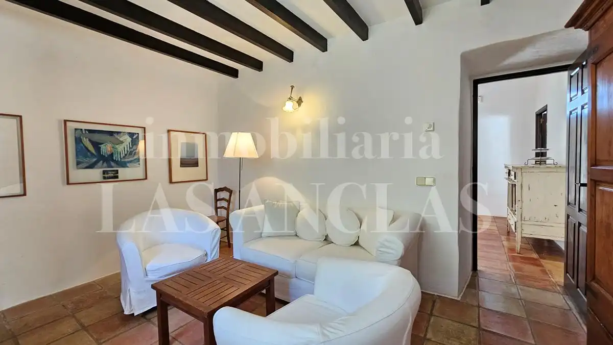 Wohnzimmer von Country house zum Verkauf in Santa Eulària des Riu mit Klimaanlage, Heizung und Terrasse