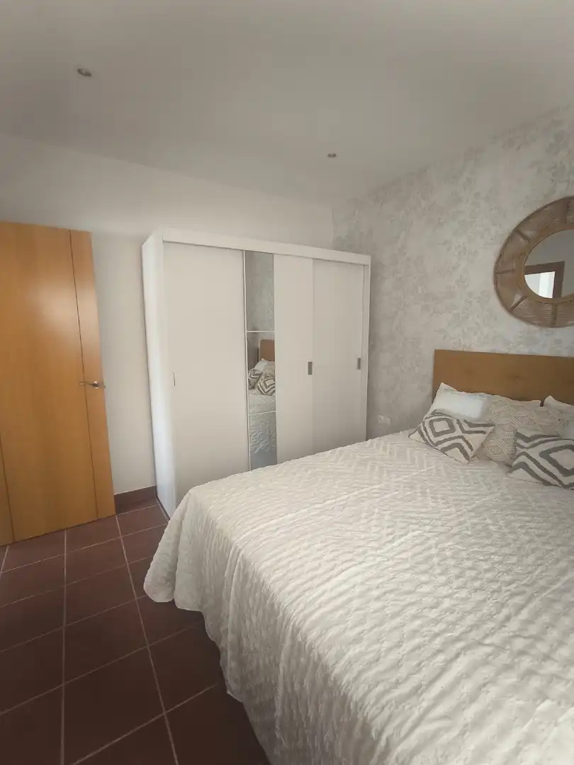 Dormitori de Apartament de lloguer en Málaga amb Aire condicionat i Moblat