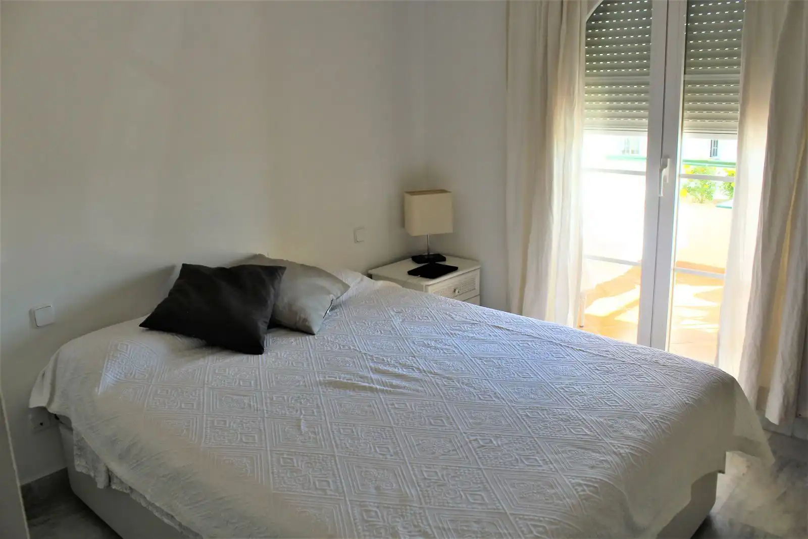 Bedroom of Flat for sale in Marbella  with Air Conditioner, Terrace and Storage room