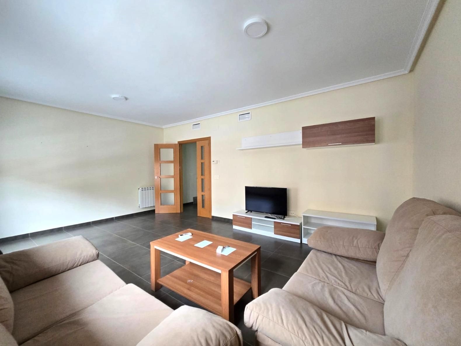 Living room of Single-family semi-detached for sale in Plasencia  with Air Conditioner, Heating and Terrace