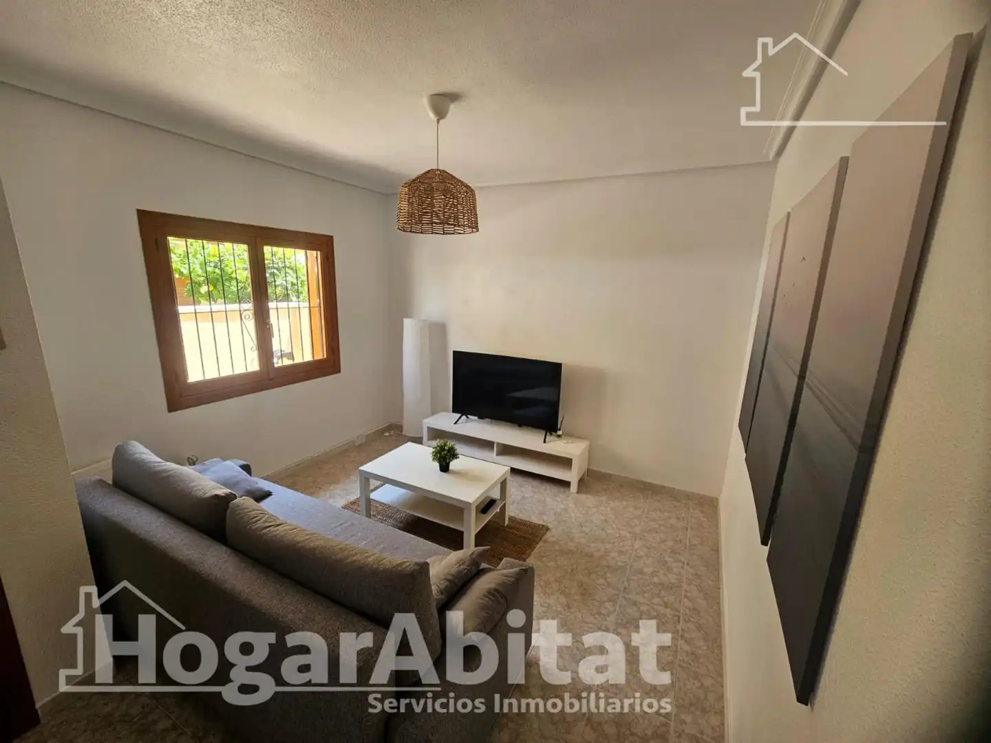 Sala d'estar de Casa adosada en venda en Orihuela amb Jardí privat i Piscina comunitària