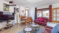 Sala d'estar de Casa adosada en venda en Armilla amb Aire condicionat i Terrassa