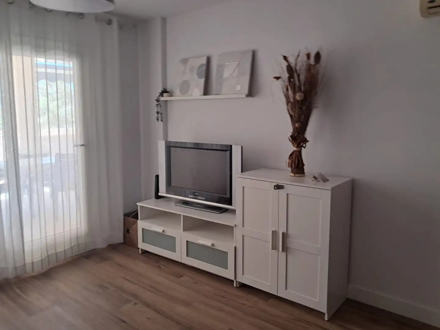 Sala d'estar de Apartament de lloguer en Torrox amb Aire condicionat, Calefacció i Terrassa