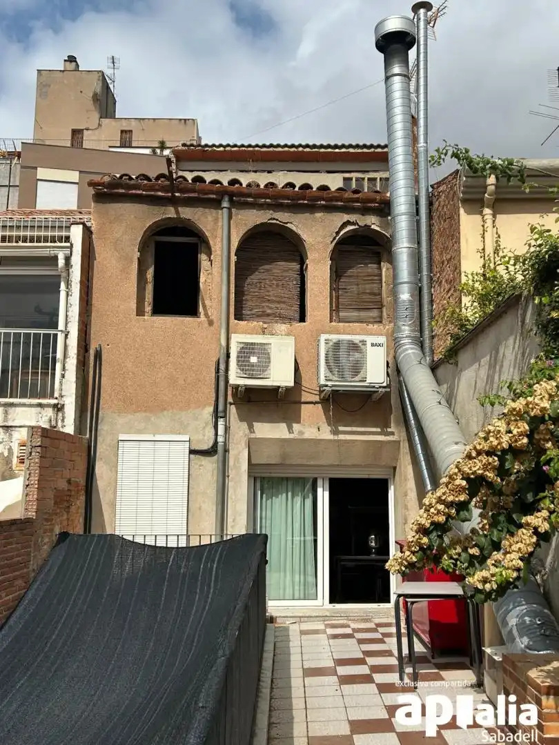Carrer Nou de Sant Pere, Barri del Centre