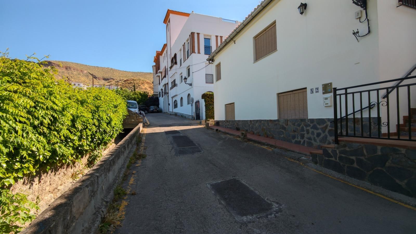 Exterior view of Planta baja for sale in Cenes de la Vega  with Air Conditioner, Terrace and Storage room