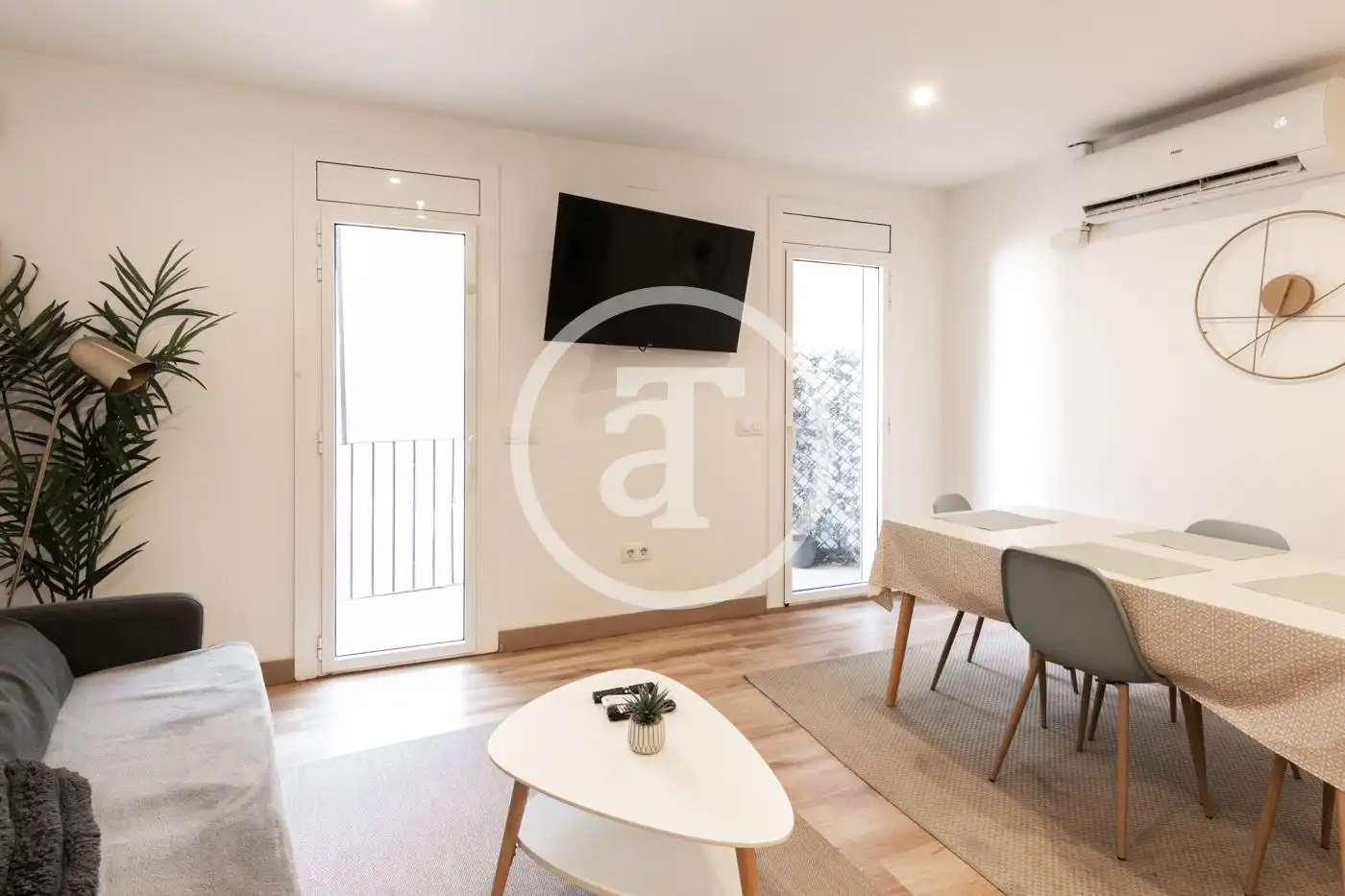 Sala de estar de Piso de alquiler en  Barcelona Capital con Aire acondicionado, Calefacción y Amueblado