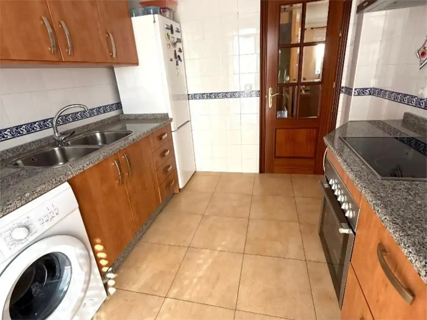 Cuina de Casa adosada en venda en El Pedroso amb Aire condicionat i Balcó