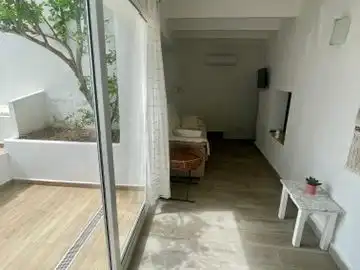 Wohnzimmer von Erdgeschoss zur Miete in Es Mercadal mit Klimaanlage, Heizung und Terrasse