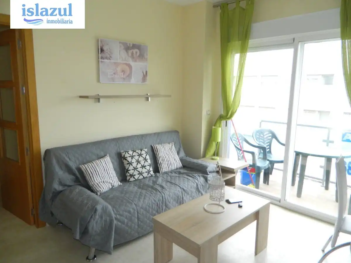 Sala de estar de Apartamento de alquiler en Isla Cristina con Aire acondicionado, Jardín privado y Terraza