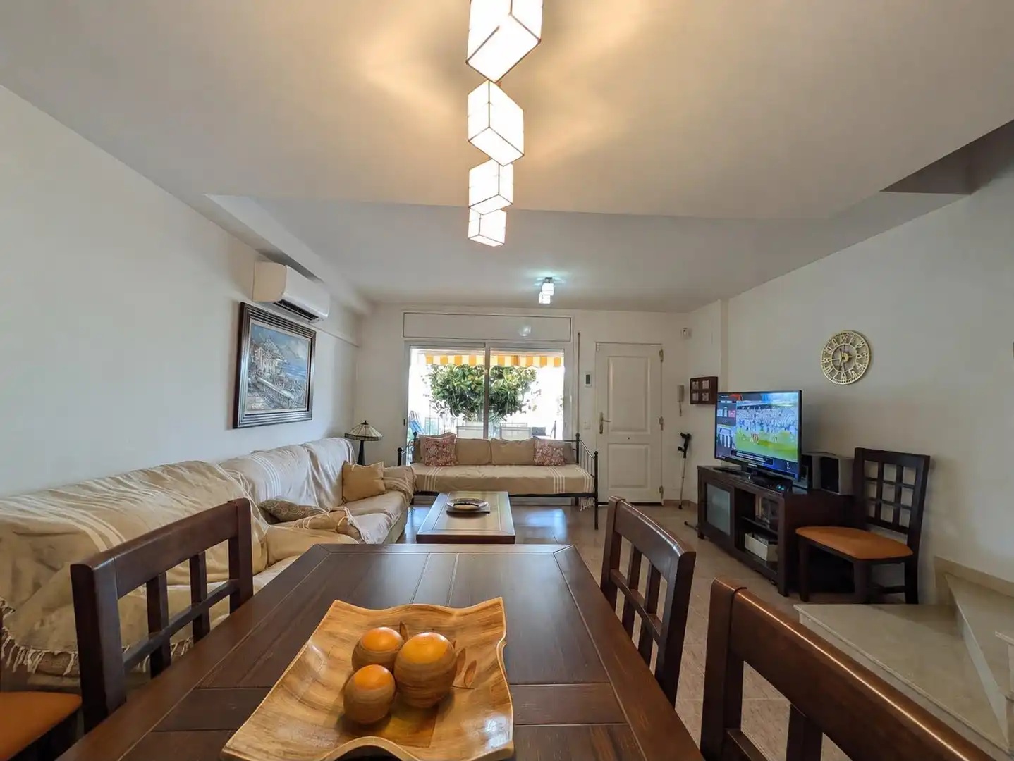 Sala de estar de Casa adosada en venta en Creixell con Aire acondicionado, Jardín privado y Terraza