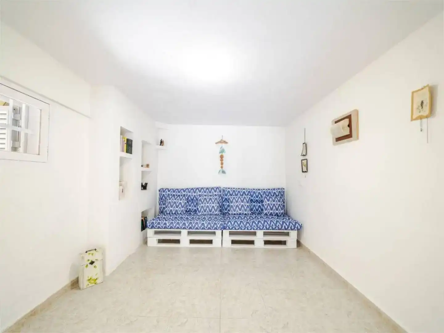 Sala d'estar de Casa adosada de lloguer en Santanyí amb Aire condicionat, Jardí privat i Moblat