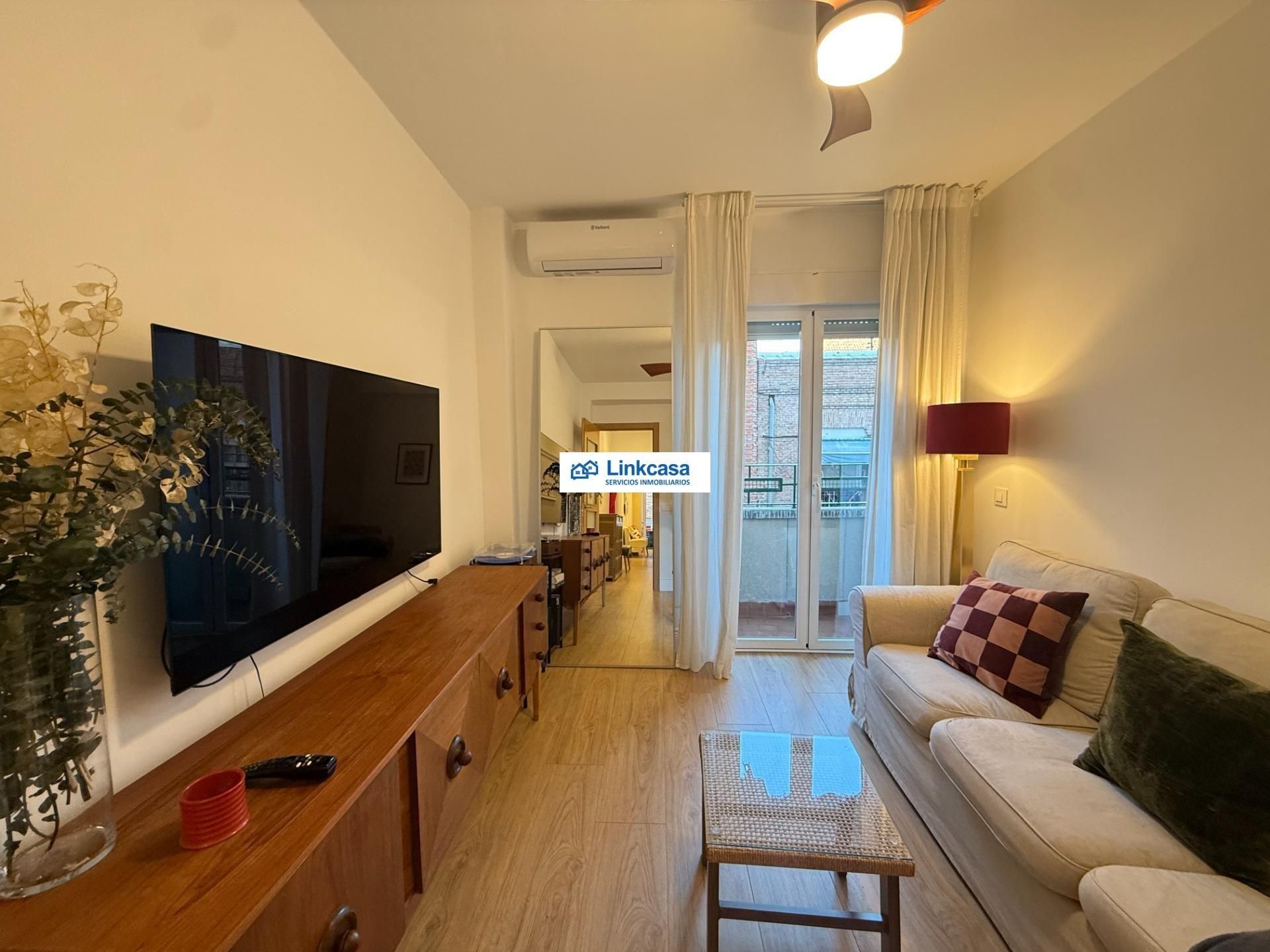 Wohnzimmer von Wohnung zum Verkauf in  Madrid Capital mit Klimaanlage, Privatgarten und Terrasse
