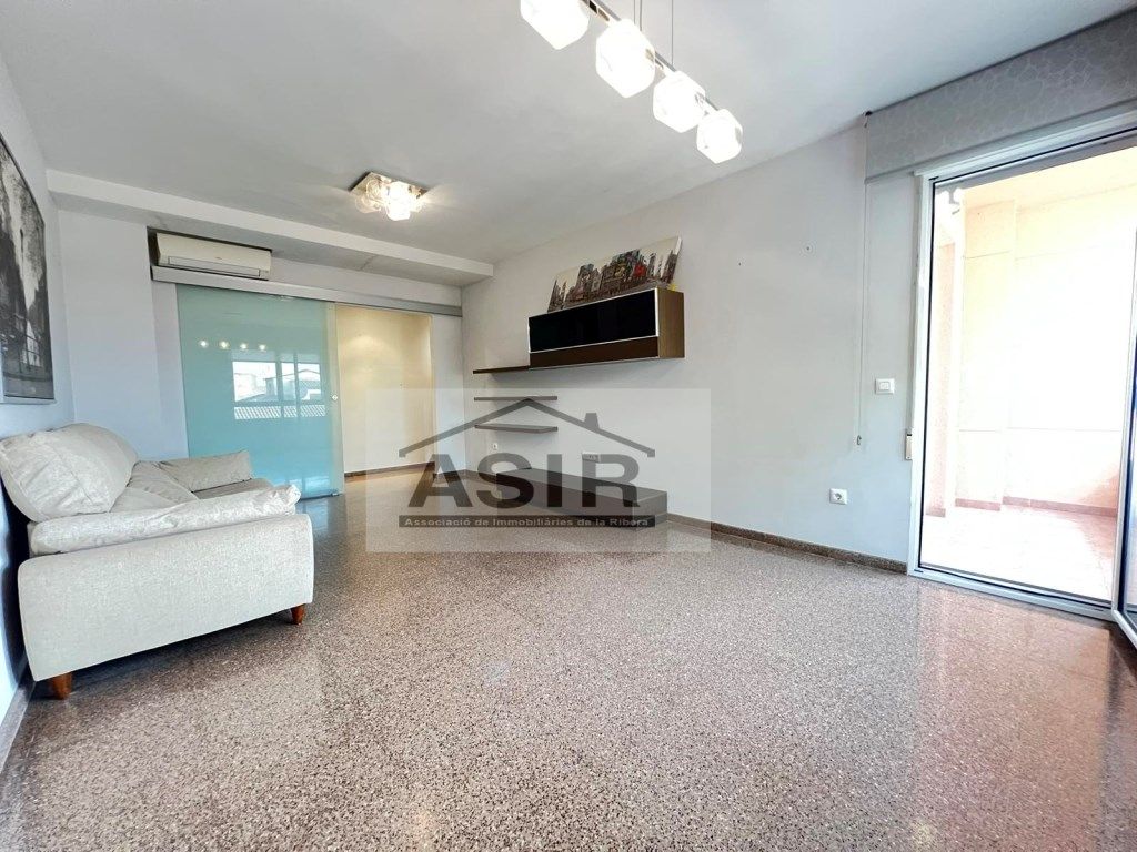 Living room of Flat for sale in Manuel  with Air Conditioner and Balcony