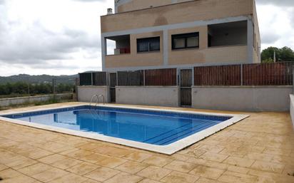 Swimming pool of Flat for sale in Calafell  with Air Conditioner, Terrace and Balcony