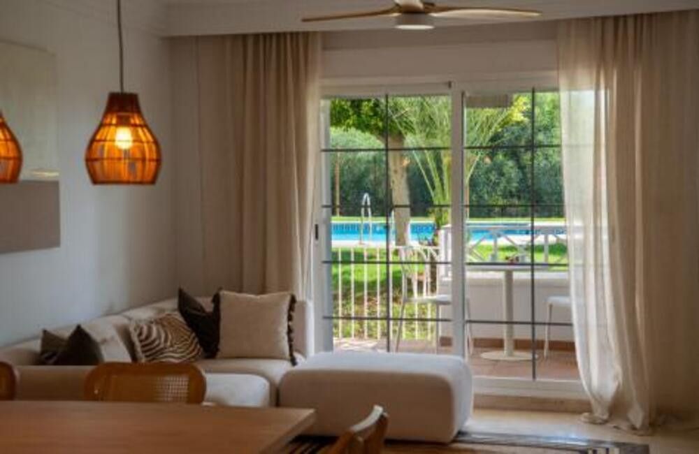 Living room of Planta baja for sale in Marbella  with Air Conditioner, Terrace and Storage room