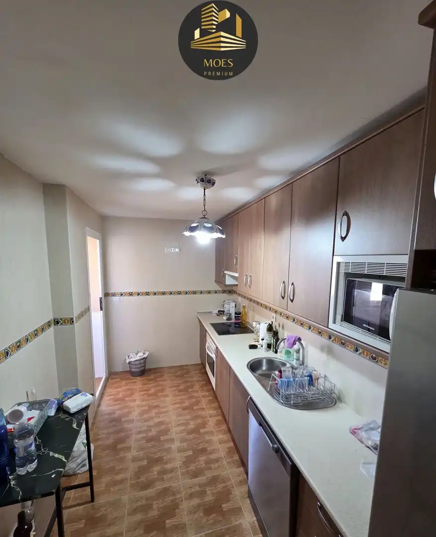 Kitchen of Flat for sale in Mengíbar  with Air Conditioner, Terrace and Storage room