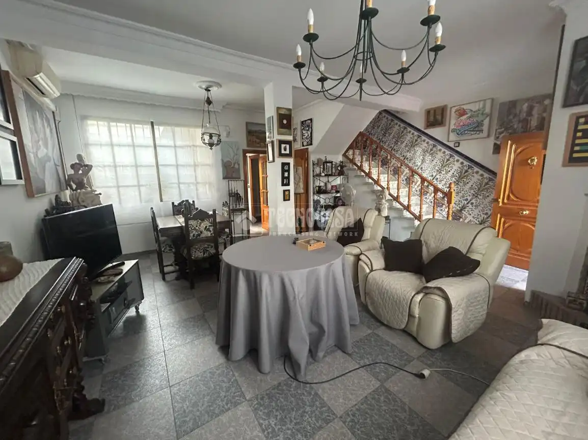 Sala de estar de Casa adosada en venta en Huelva con Aire acondicionado