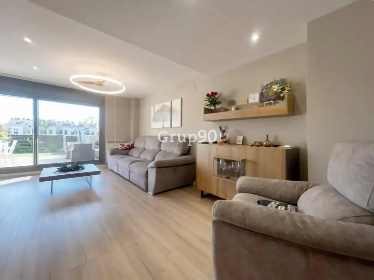 Sala de estar de Casa adosada en venta en Lleida con Aire acondicionado, Calefacción y Jardín privado
