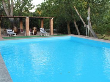 Casa rústica amb piscina en venda a Partidas Norte