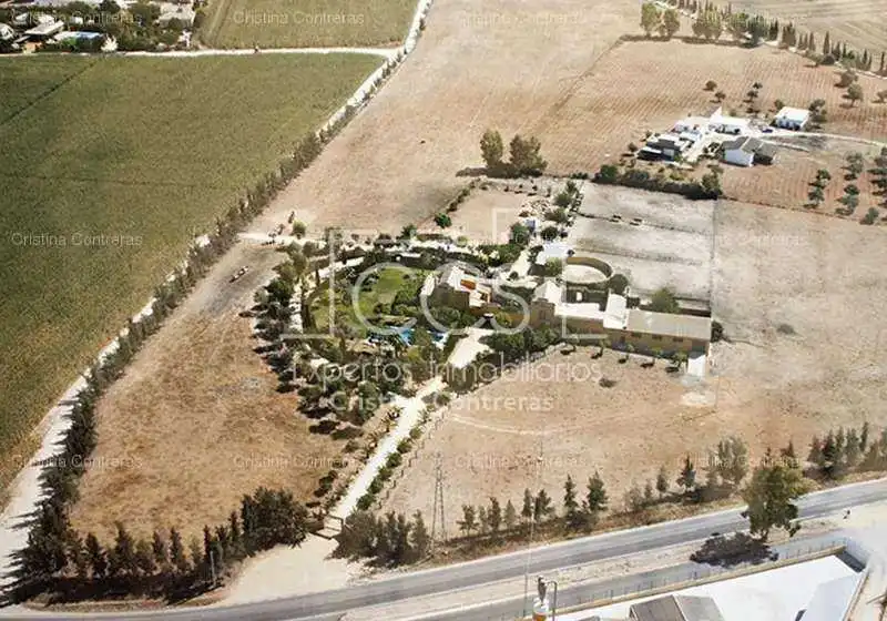 Vista exterior de Finca rústica en venta en Alcalá de Guadaira con Jardín privado y Piscina