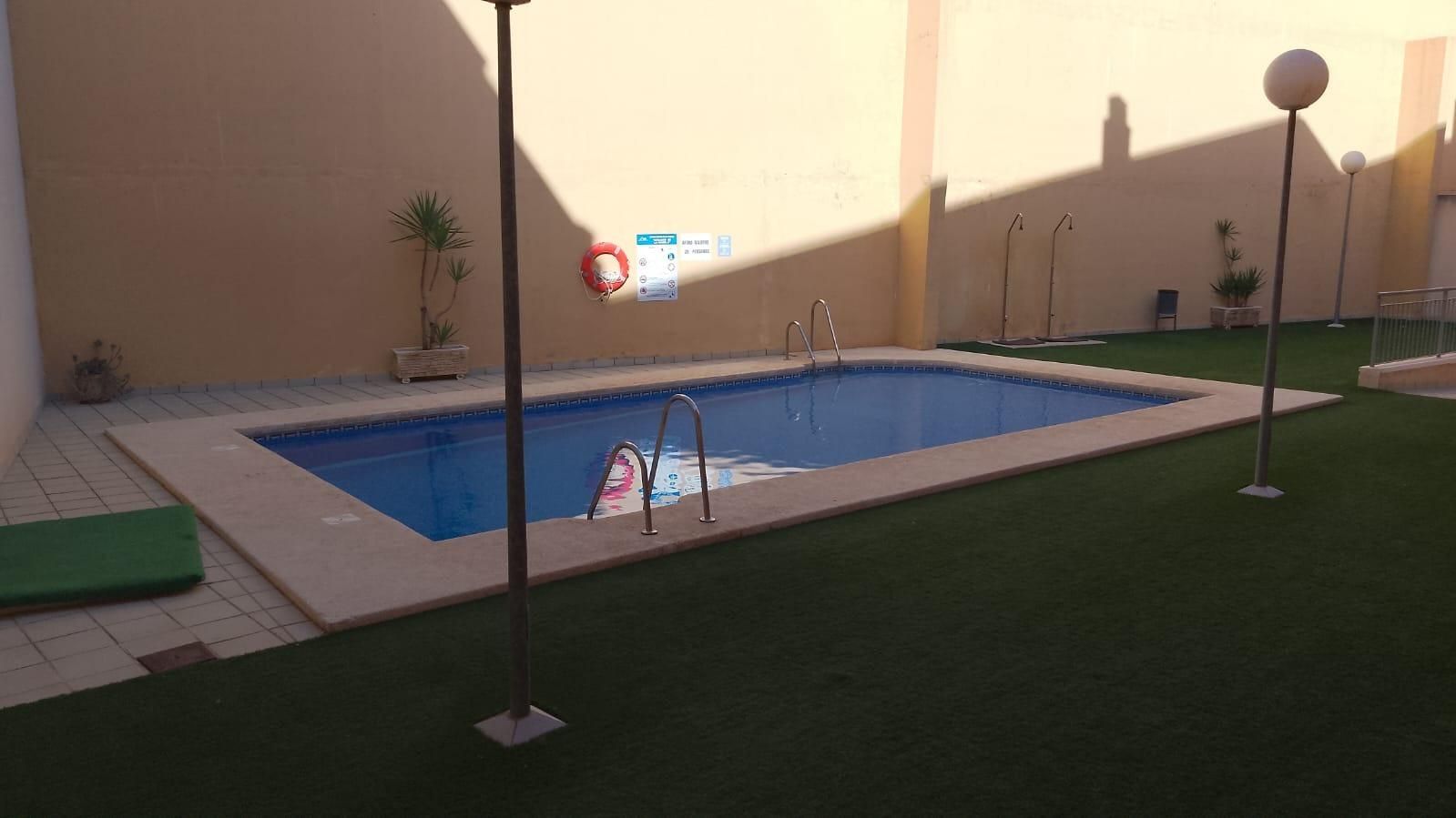 Swimming pool of Flat for sale in Roquetas de Mar  with Air Conditioner, Terrace and Community pool
