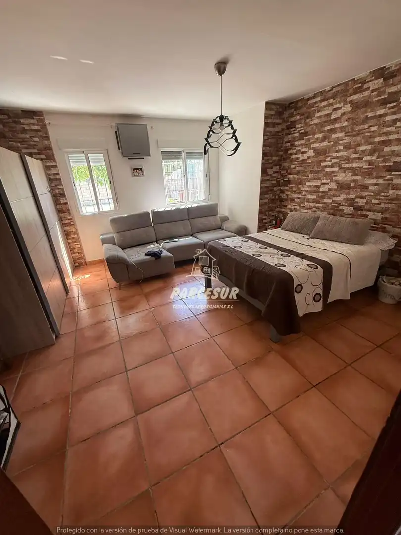 Sala d'estar de Casa o xalet en venda en Córdoba amb Aire condicionat i Jardí privat
