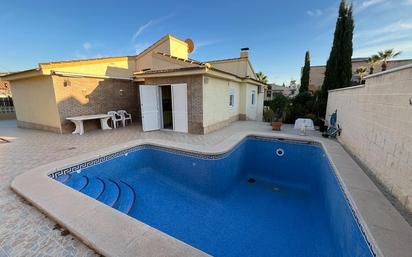 Swimming pool of House or chalet for sale in Torrevieja  with Air Conditioner, Private garden and Terrace