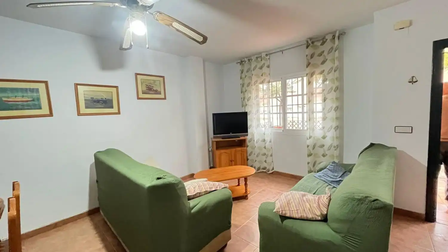 Sala de estar de Casa adosada en venta en Islantilla con Terraza y Piscina comunitaria