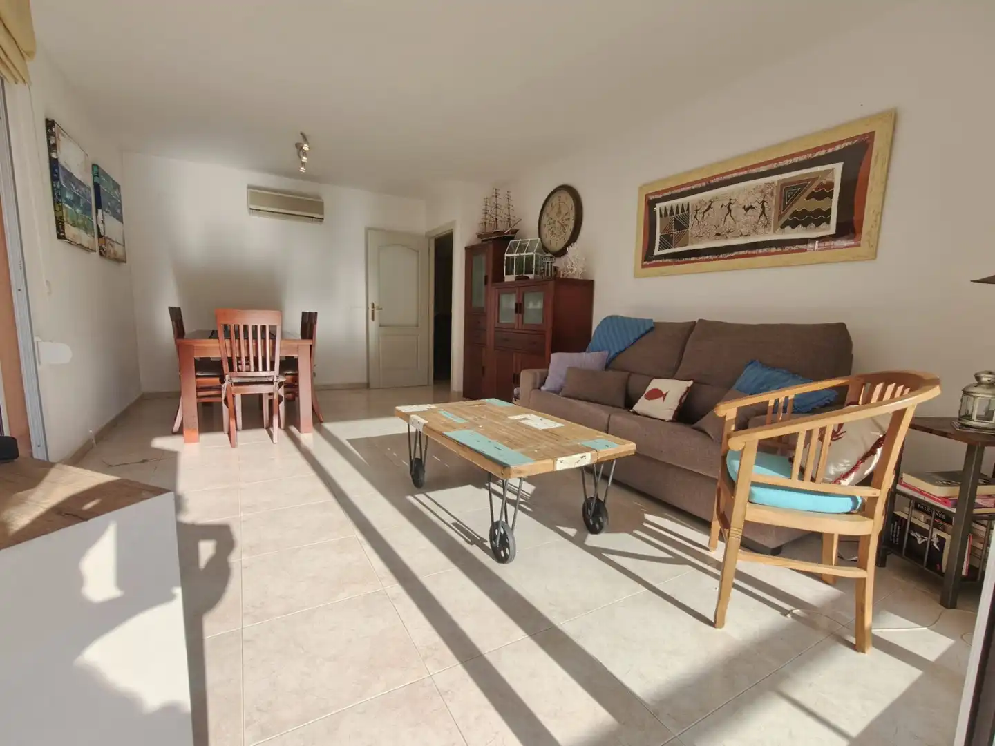 Sala d'estar de Apartament en venda en Calonge i Sant Antoni amb Aire condicionat, Terrassa i Moblat