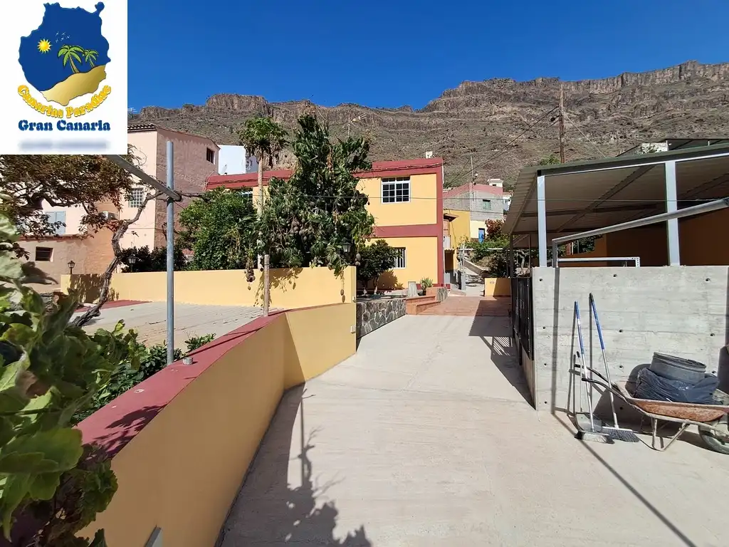 Außenansicht von Wohnung zum Verkauf in Mogán mit Privatgarten und Terrasse