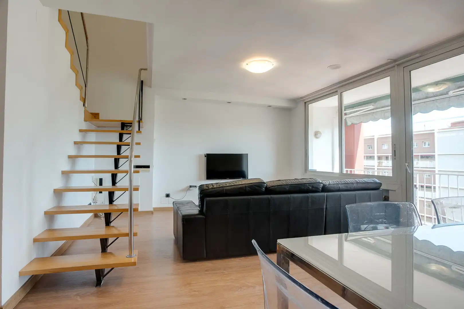 Living room of Duplexes for sale in  Barcelona Capital  with Heating and Balcony