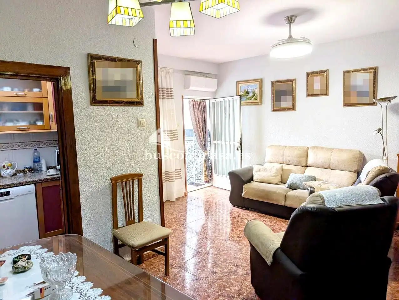 Sala d'estar de Casa adosada en venda en Jaén amb Aire condicionat, Terrassa i Balcó