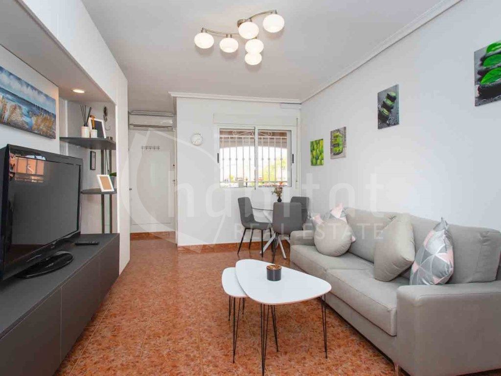 Sala de estar de Apartamento en venta en Los Montesinos con Aire acondicionado, Jardín privado y Amueblado