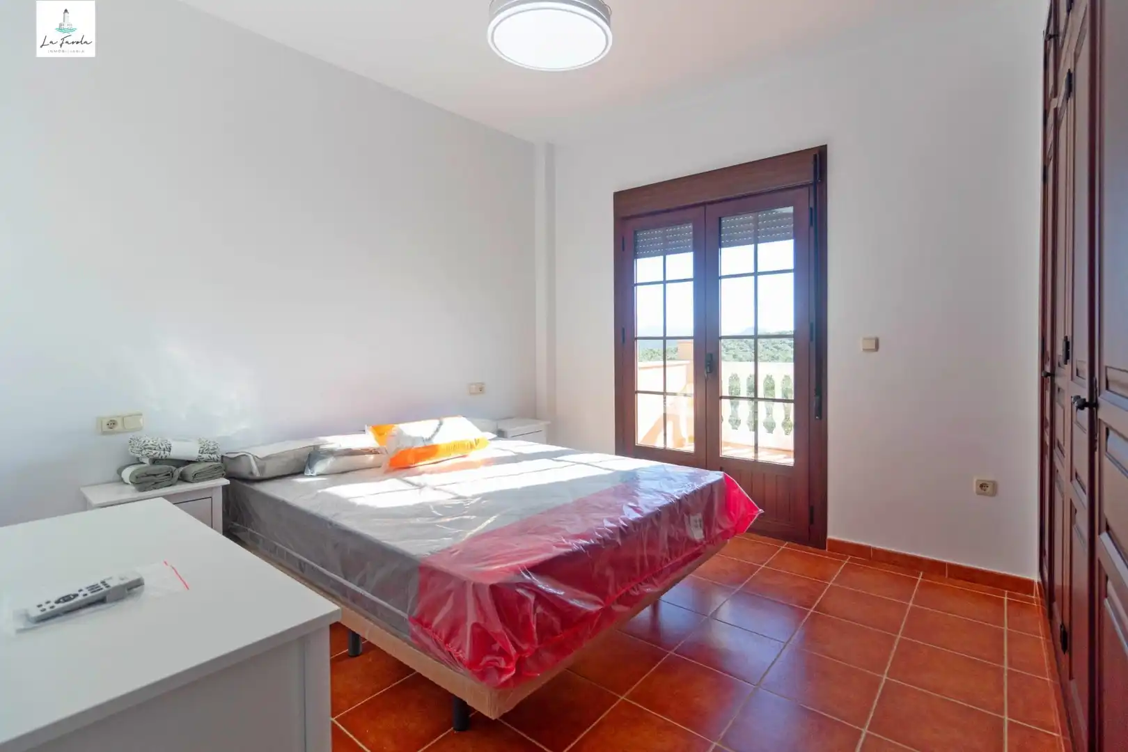 Dormitori de Casa adosada de lloguer en Archidona amb Aire condicionat, Terrassa i Moblat