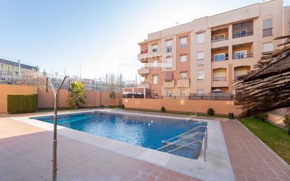 Swimming pool of Flat for sale in  Granada Capital  with Air Conditioner, Heating and Terrace