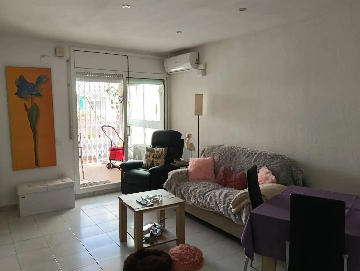 Sala d'estar de Planta baixa en venda en Cunit amb Aire condicionat, Jardí privat i Terrassa