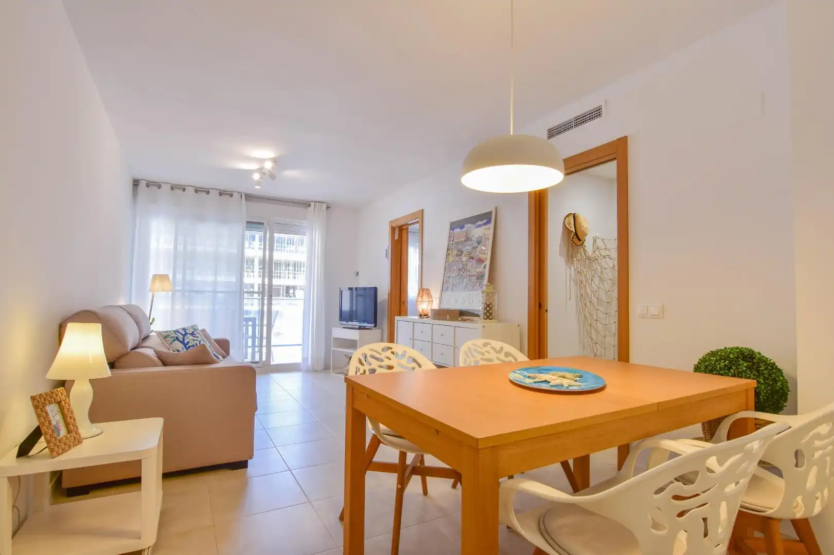 Sala d'estar de Apartament de lloguer en El Puig de Santa Maria amb Calefacció, Jardí privat i Terrassa